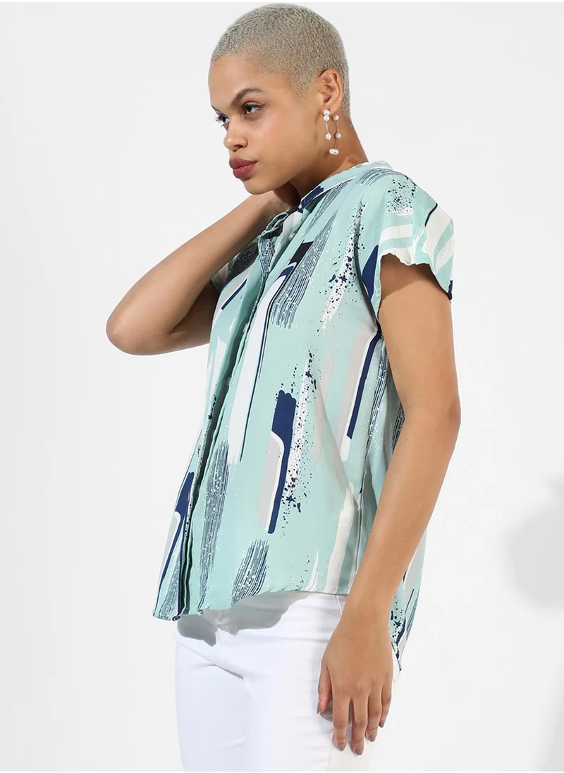 كامبوس سوترا Campus Sutra Women's Sage Green Printed Regular Fit Top For Casual Wear | Spread Collar | Short Sleeve | Top Crafted With Regular Sleeve, Comfort Fit & High-Performance For Everyday Wear