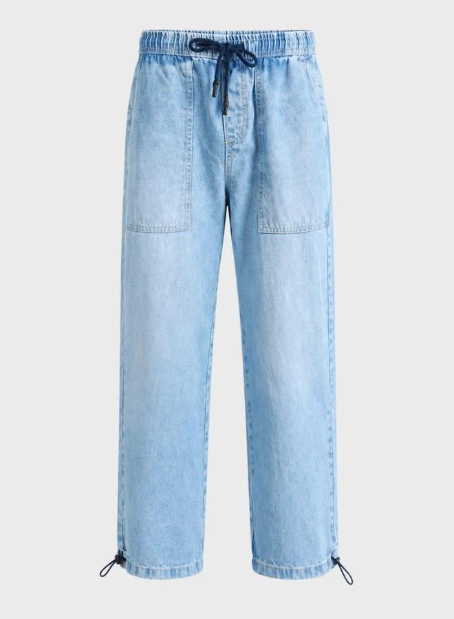 The Indian Garage Co  Men Relaxed Jogger Fit Solid Jeans for Men | Best Price UAE