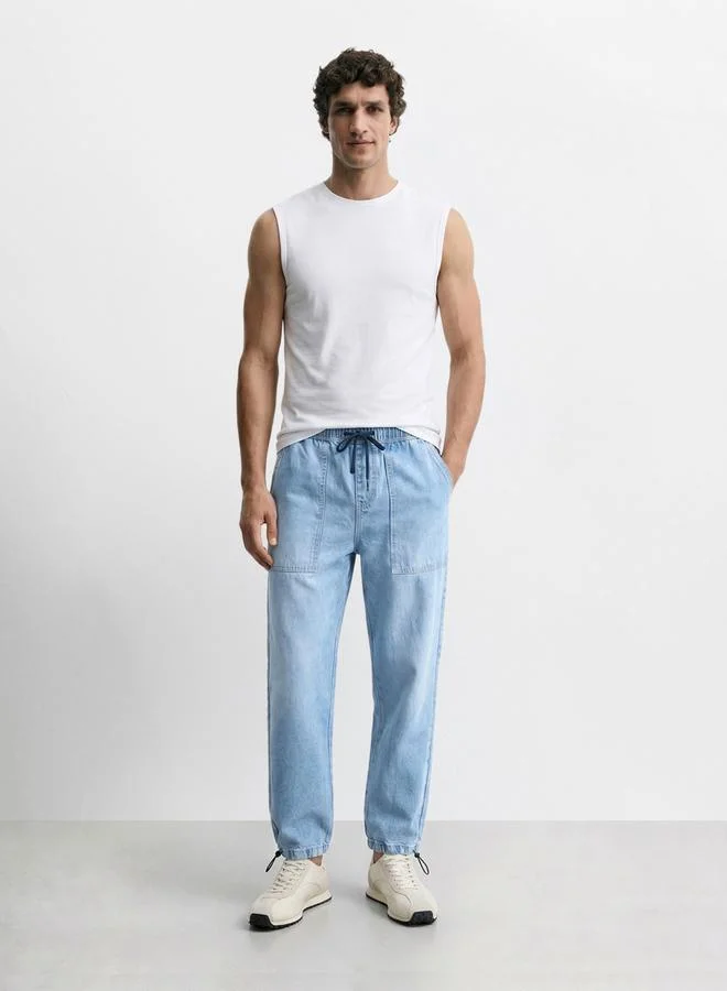 The Indian Garage Co  Men Relaxed Jogger Fit Solid Jeans for Men | Best Price UAE