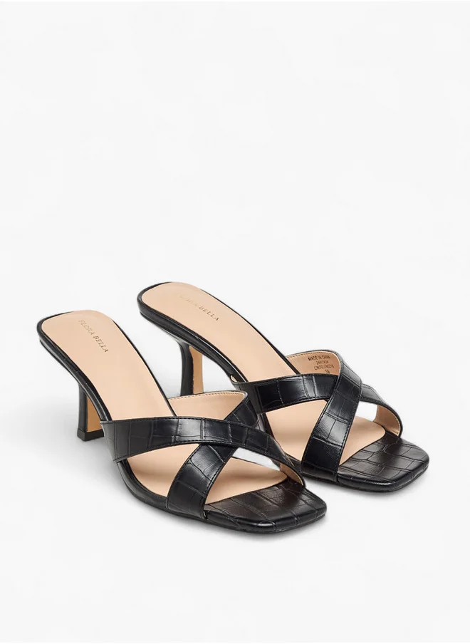 فلورا بيلا من شو إكسبرس Women's Textured Cross Strap Slip-on Sandals with Kitten Heels