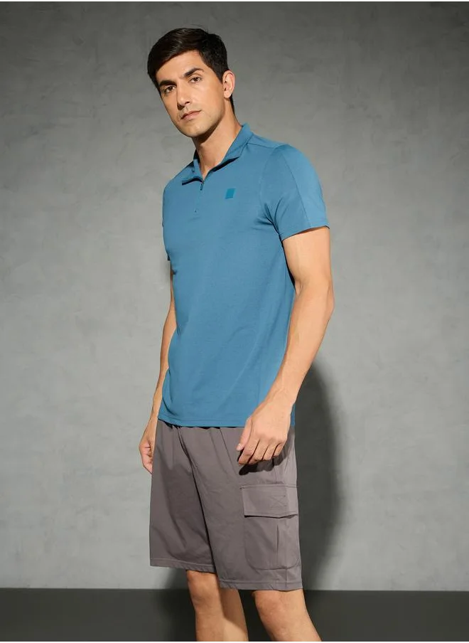 تكنوسبورت Technosport Solid 4-Way Stretch Half Zip Front Slim Fit Polo T-Shirt
