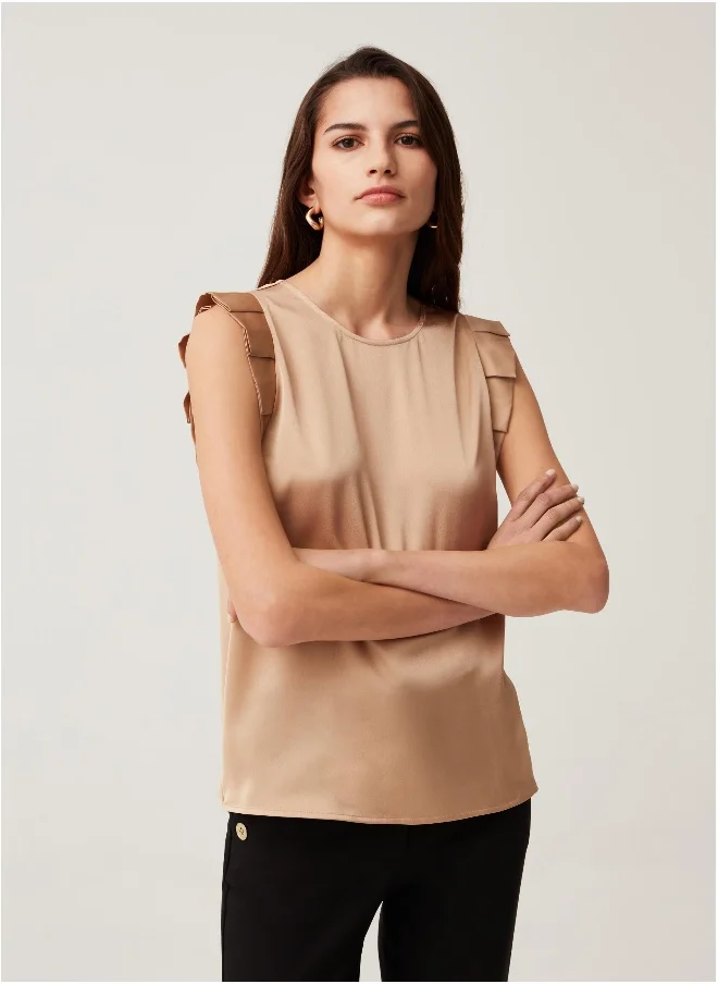 او في اس Sleeveless blouse with ruffles
