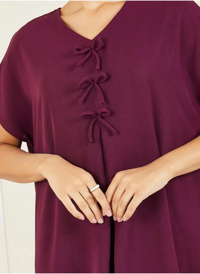 ستايلي Bow Tie Detail Under Abaya Dress