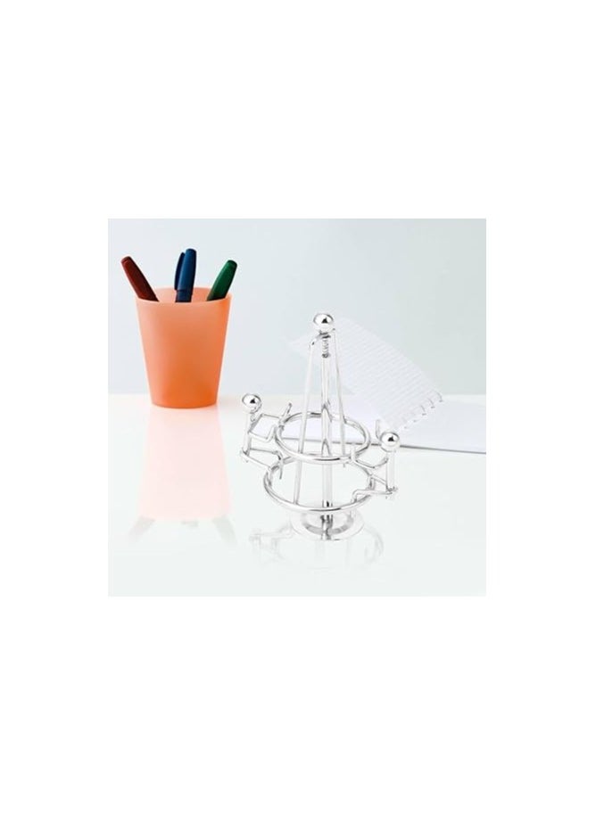 Generic - "Enjoy an experience of balance and calm with the Newton's Cradle - elegant design, smooth movement, and a clever decorative touch that adds a sophisticated scientific touch to your office or home. " - Image 1
