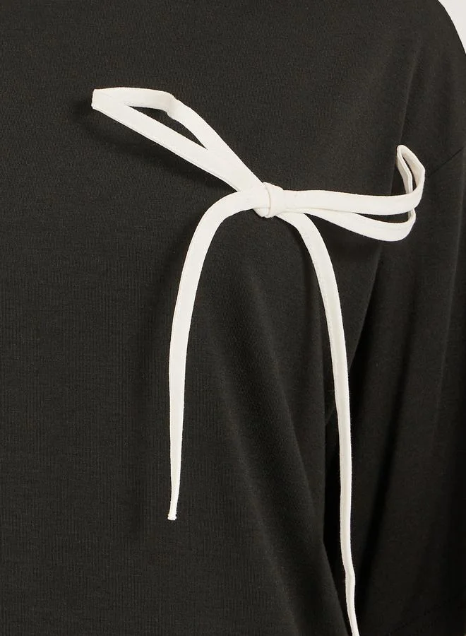 Styli Women Black Oversized Bow Detail Longline T-Shirt