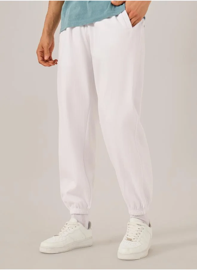 Styli Men White Solid Joggers