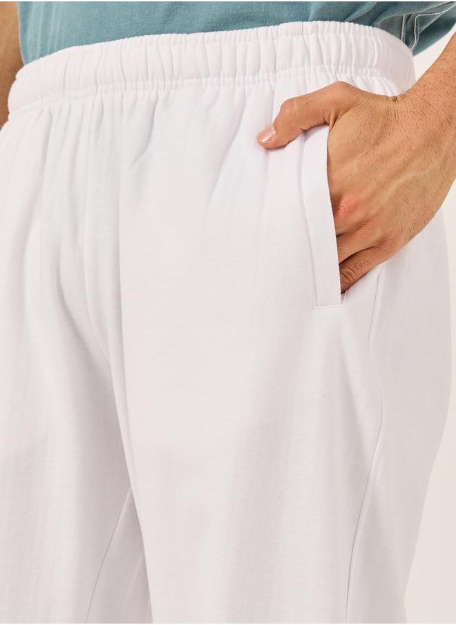 Styli Men White Solid Joggers  - Image 4