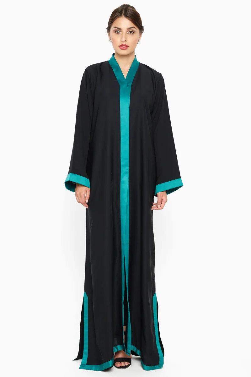 النخبة A gorgeous abaya with shimmering blue satin stripe detail by the sleeves ; side slits and closure .-AJ589A