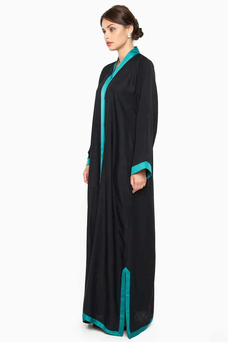 النخبة A gorgeous abaya with shimmering blue satin stripe detail by the sleeves ; side slits and closure .-AJ589A