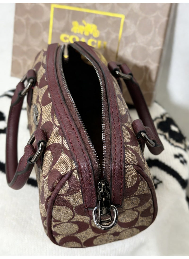 coachoutlet Coach Mini Boston Bag in Signature Canvas with Maroon Leather Trims - Image 2