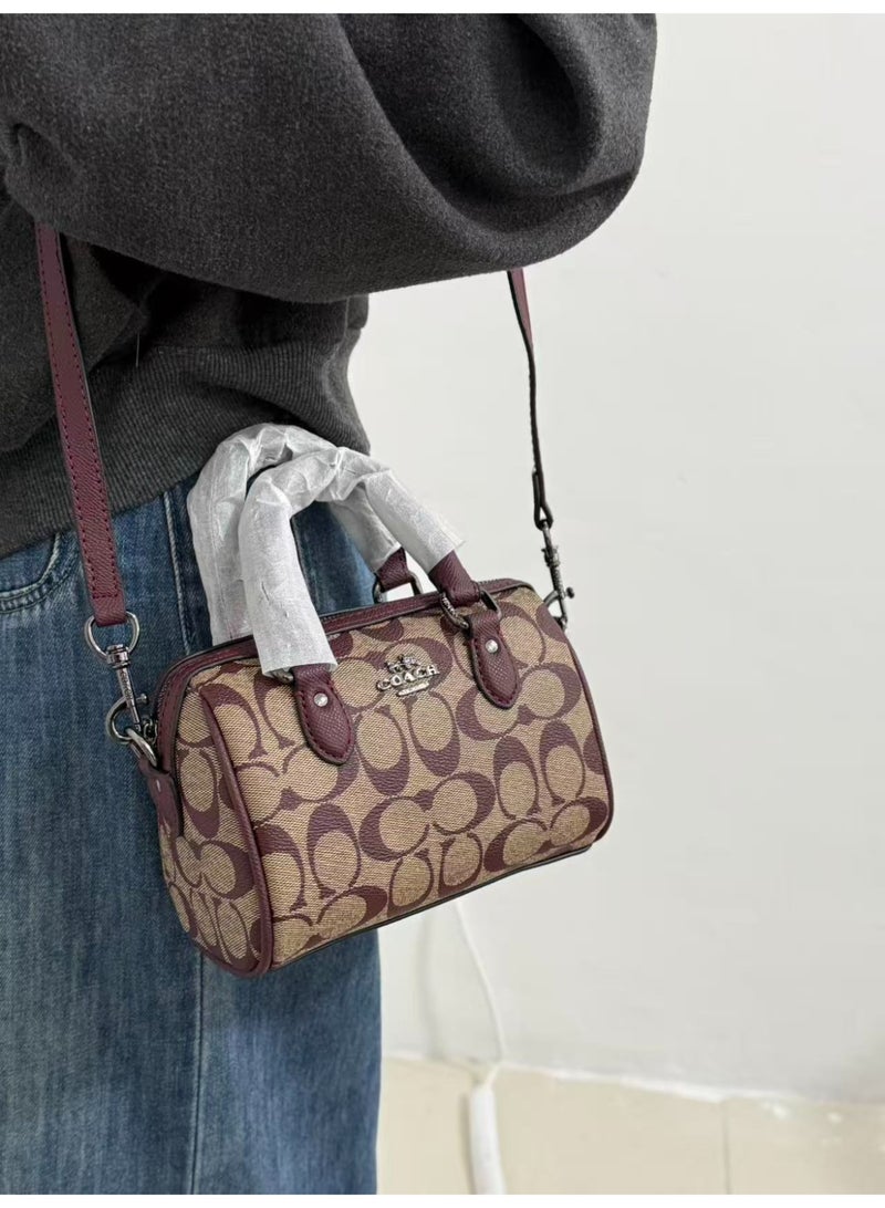 coachoutlet Coach Mini Boston Bag in Signature Canvas with Maroon Leather Trims - Image 3