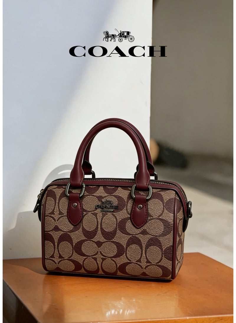 coachoutlet Coach Mini Boston Bag in Signature Canvas with Maroon Leather Trims - Image 1