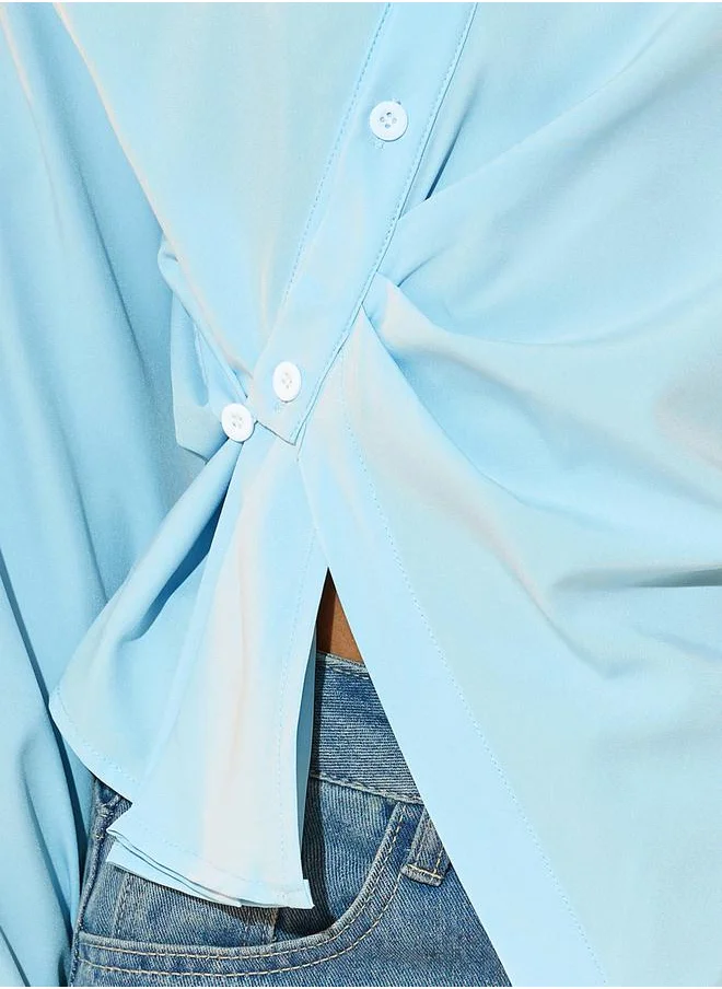 ستايلي Solid Asymmetric Hem Shirt with Wrap Detail