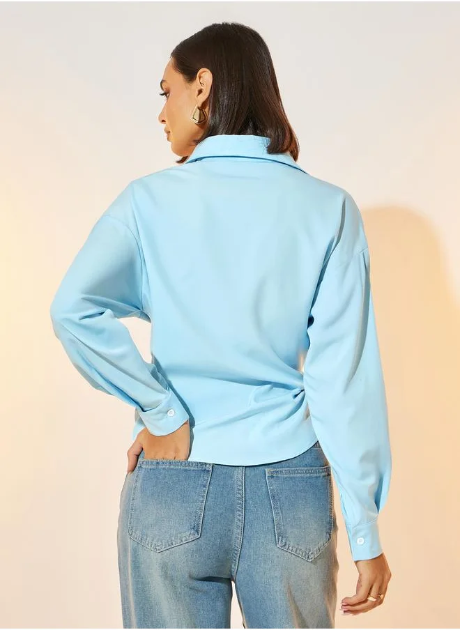 ستايلي Solid Asymmetric Hem Shirt with Wrap Detail