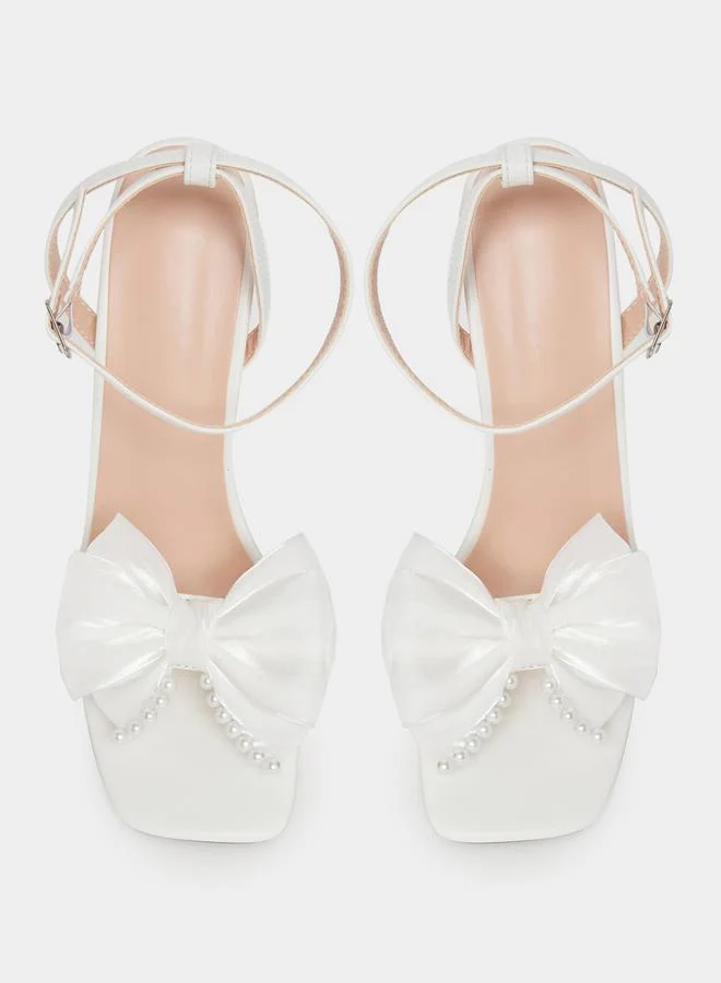 Take Two Embellished Bow Pearl Detail Stiletto Heel Sandals by Styli