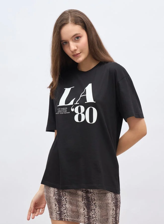ستايلي تيشيرت طويل بطبعة جرافيك فضفاض