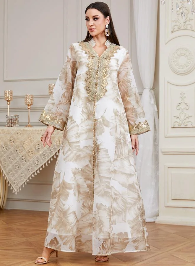 تايك تو جلابية بتفاصيل رقعة ترتر وطبعة زهور