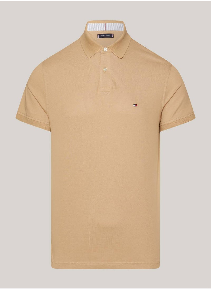 TOMMY HILFIGER - Men's 1985 Collection Flag Embroidery Regular Polo -  Stretch organic cotton, Beige - Image 1