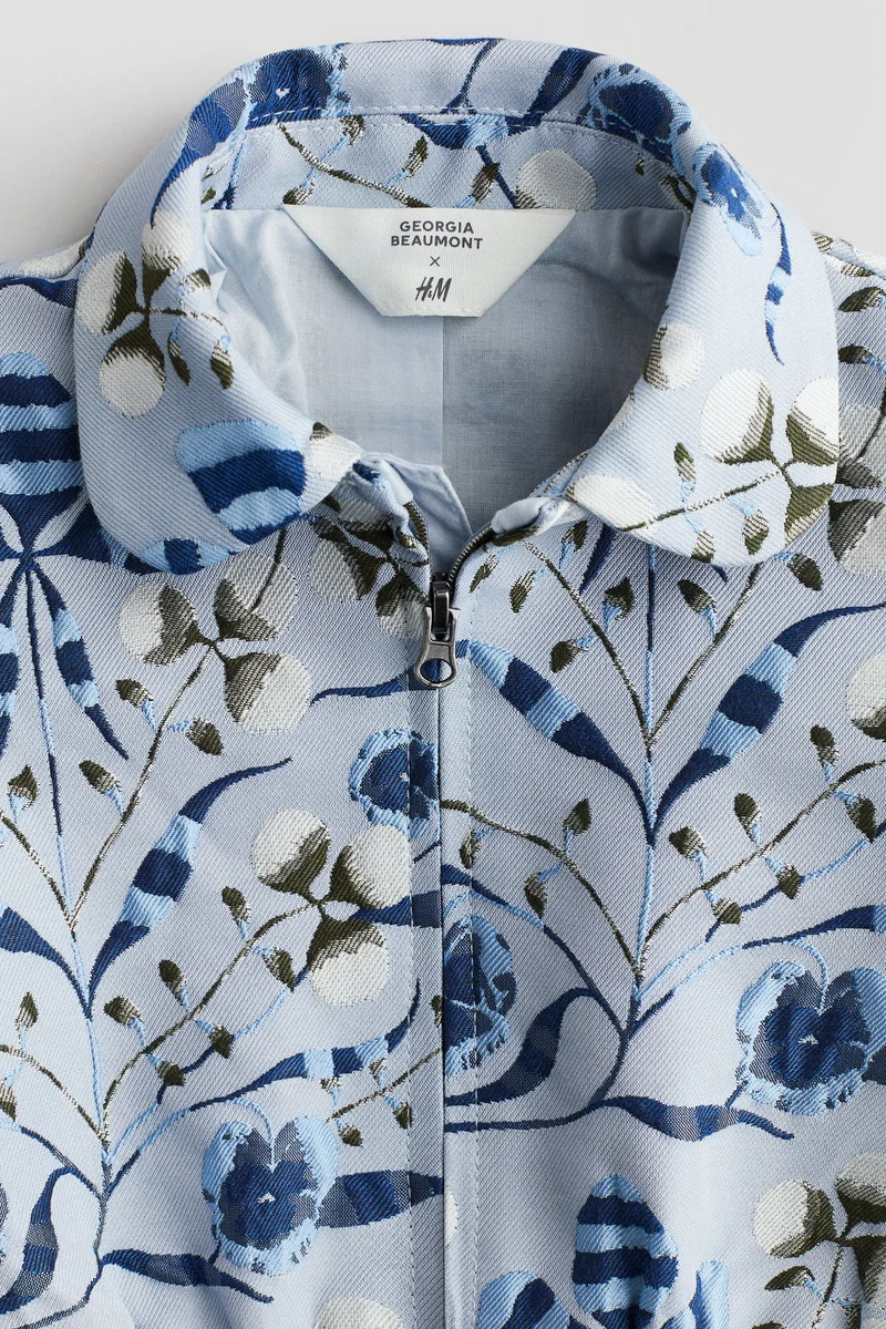 اتش اند ام جاكيت منسوجة من الجاكار بنقوش