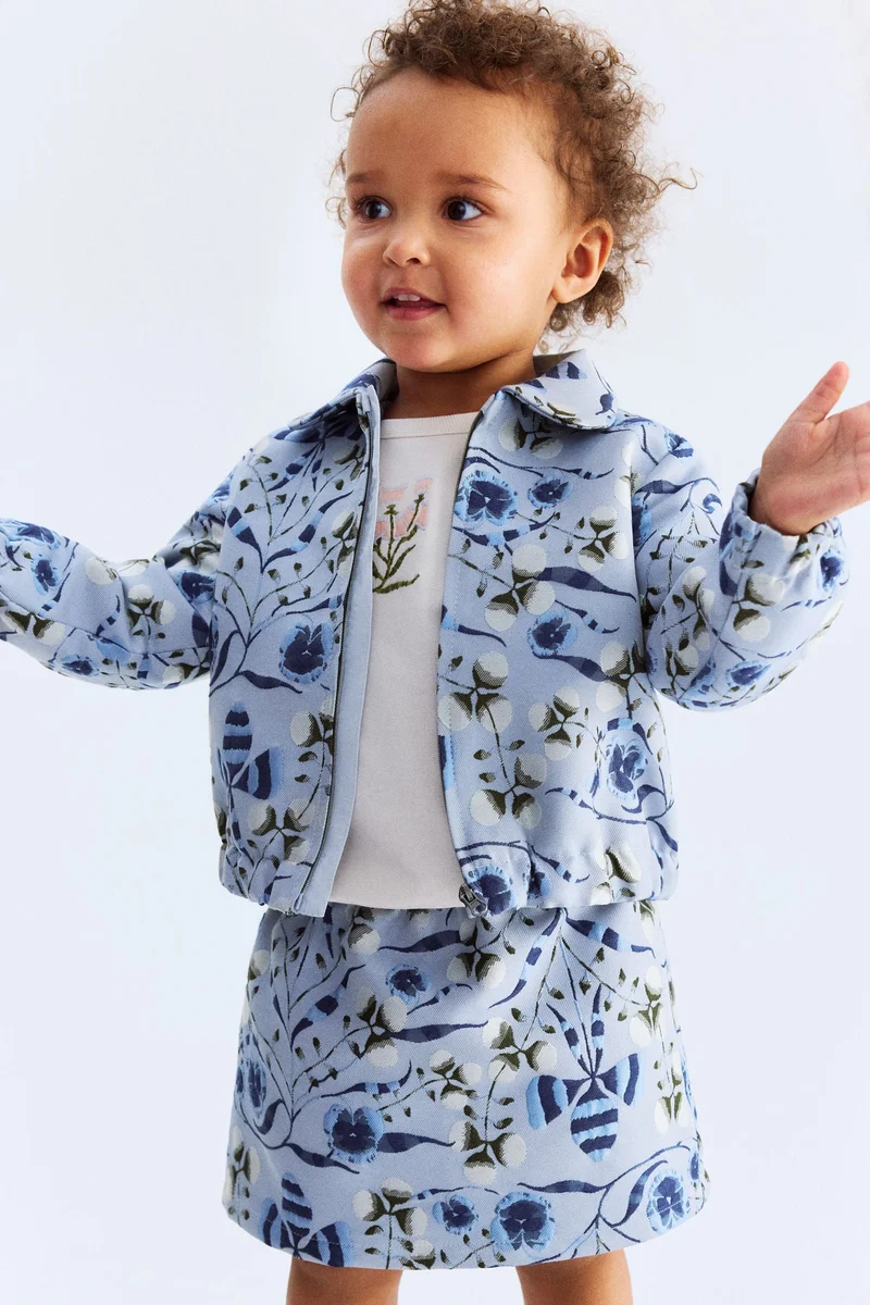 اتش اند ام جاكيت منسوجة من الجاكار بنقوش