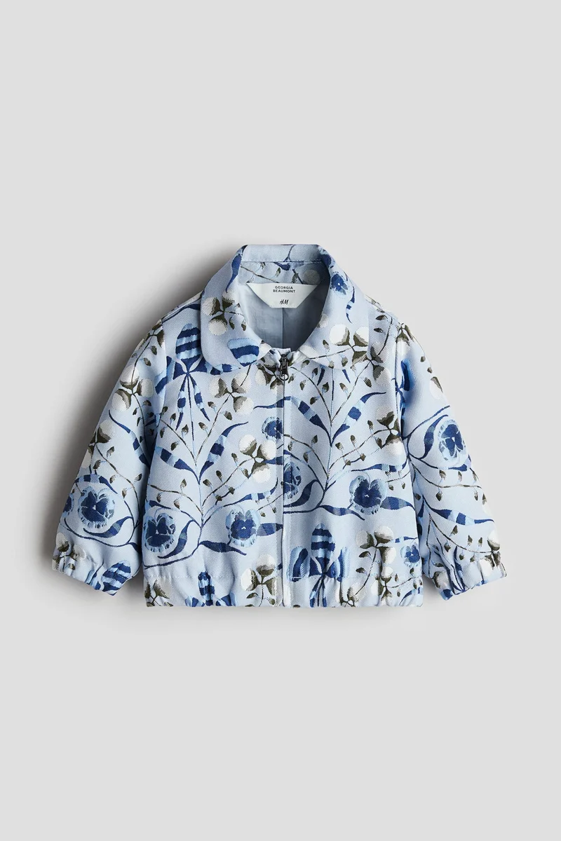 اتش اند ام جاكيت منسوجة من الجاكار بنقوش