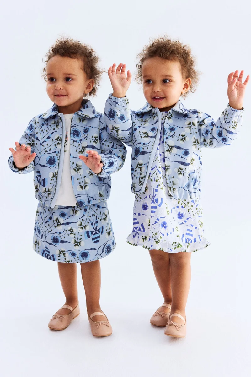 اتش اند ام جاكيت منسوجة من الجاكار بنقوش