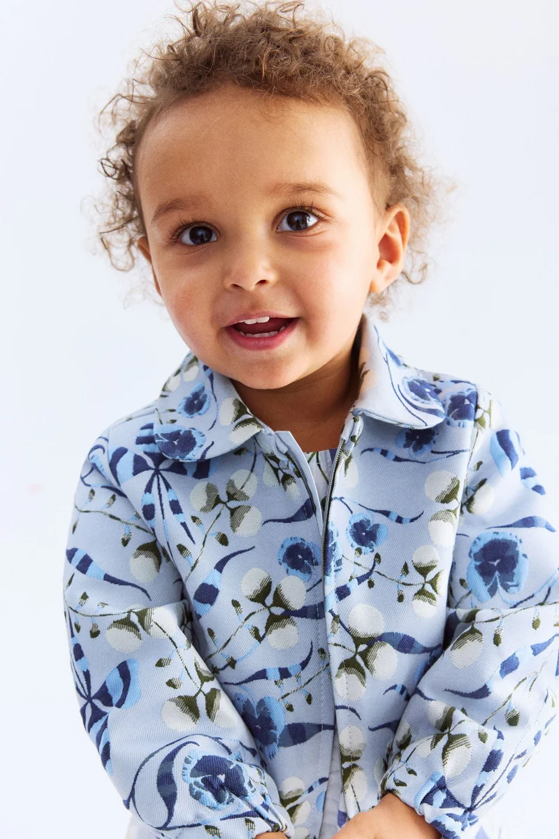 اتش اند ام جاكيت منسوجة من الجاكار بنقوش