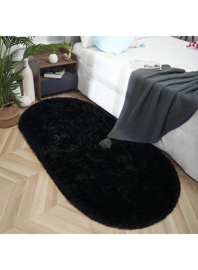 ISEAU Oval Fluffy Carpet, Modern Plush Shaggy Area Rug for Kids Bedroom, Extra Comfy Cute Nursery Bedside Mat for Boys Girls Room Home Decor, 2.6 x 5.3ft, Black - Image 1