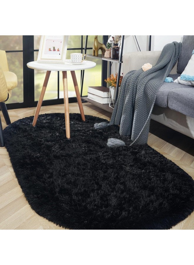 ISEAU Oval Fluffy Carpet, Modern Plush Shaggy Area Rug for Kids Bedroom, Extra Comfy Cute Nursery Bedside Mat for Boys Girls Room Home Decor, 2.6 x 5.3ft, Black - Image 3