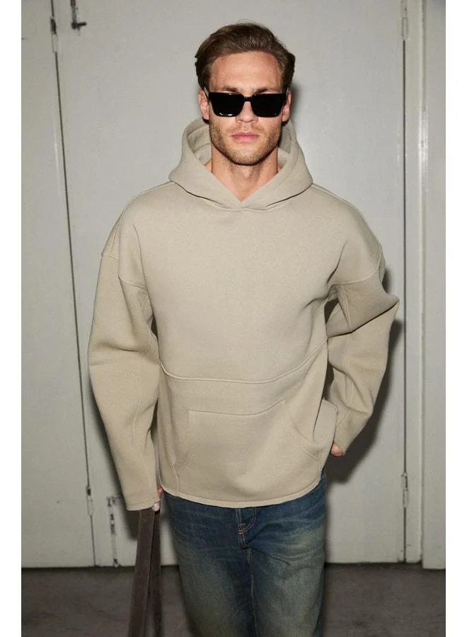 GRIMELANGE COLEGA Men's Soft-Fleece Lined Organic Cotton Kangaroo Pocket Stone-Colored Sweatshirt.