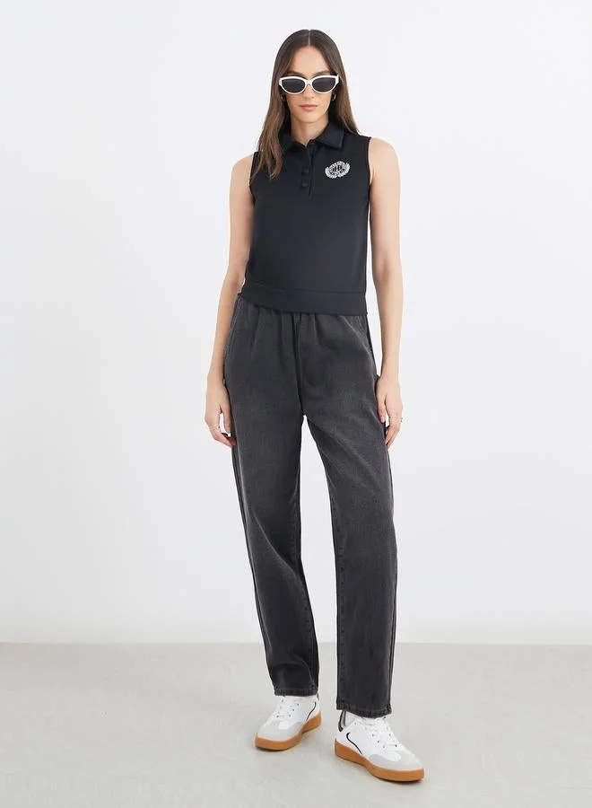 Styli Embroidered Sleeveless Knit Polo Neck Top