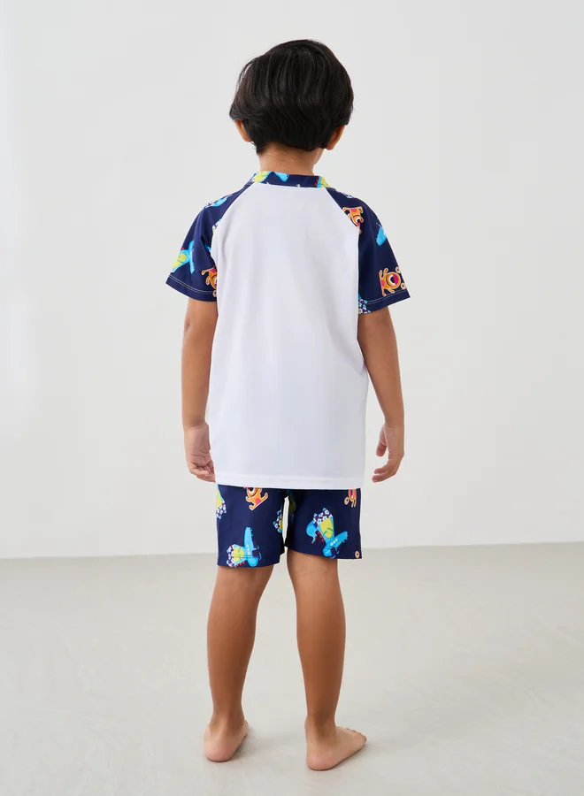 Styli Graphic Print Reglan Sleeve Swim T-Shirt with Shorts and Cap Set