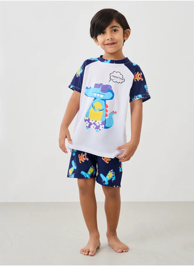 Styli Graphic Print Reglan Sleeve Swim T-Shirt with Shorts and Cap Set