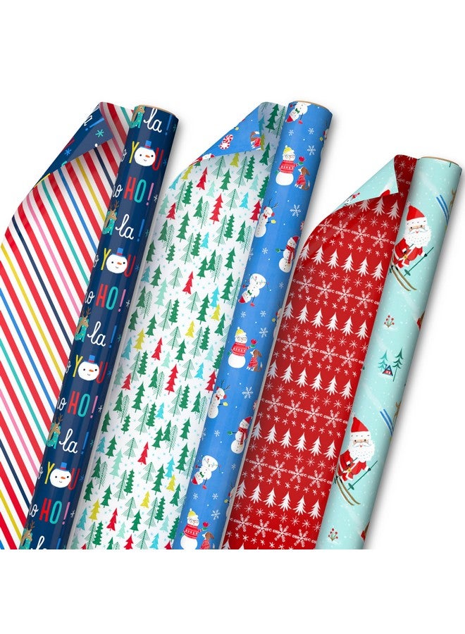 Hallmark Reversible Christmas Wrapping Paper For Kids (3 Rolls: 120 Sq. Ft. Total) Snowmen, Stripes, Trees, Skiing Santa, Zebras, Hedgehogs, Penguins - Image 1