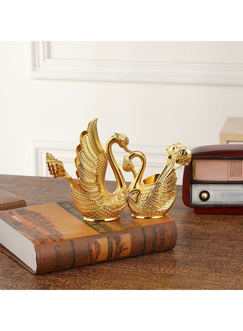 general The swan-shaped fork and spoon set is convenient to use and serves both as a storage tool and a table decoration - Image 1