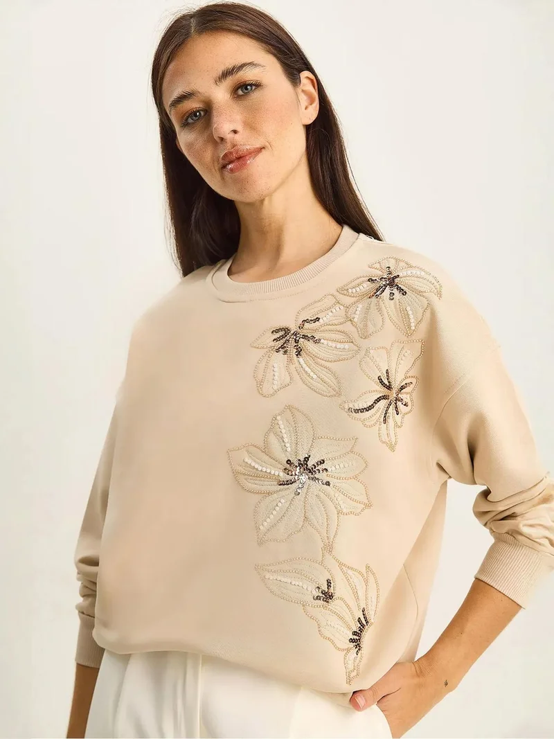 بيانكو لوتشي بلوفر لوكسي بنقشة زهور بياقة دائرية وقصة مريحة