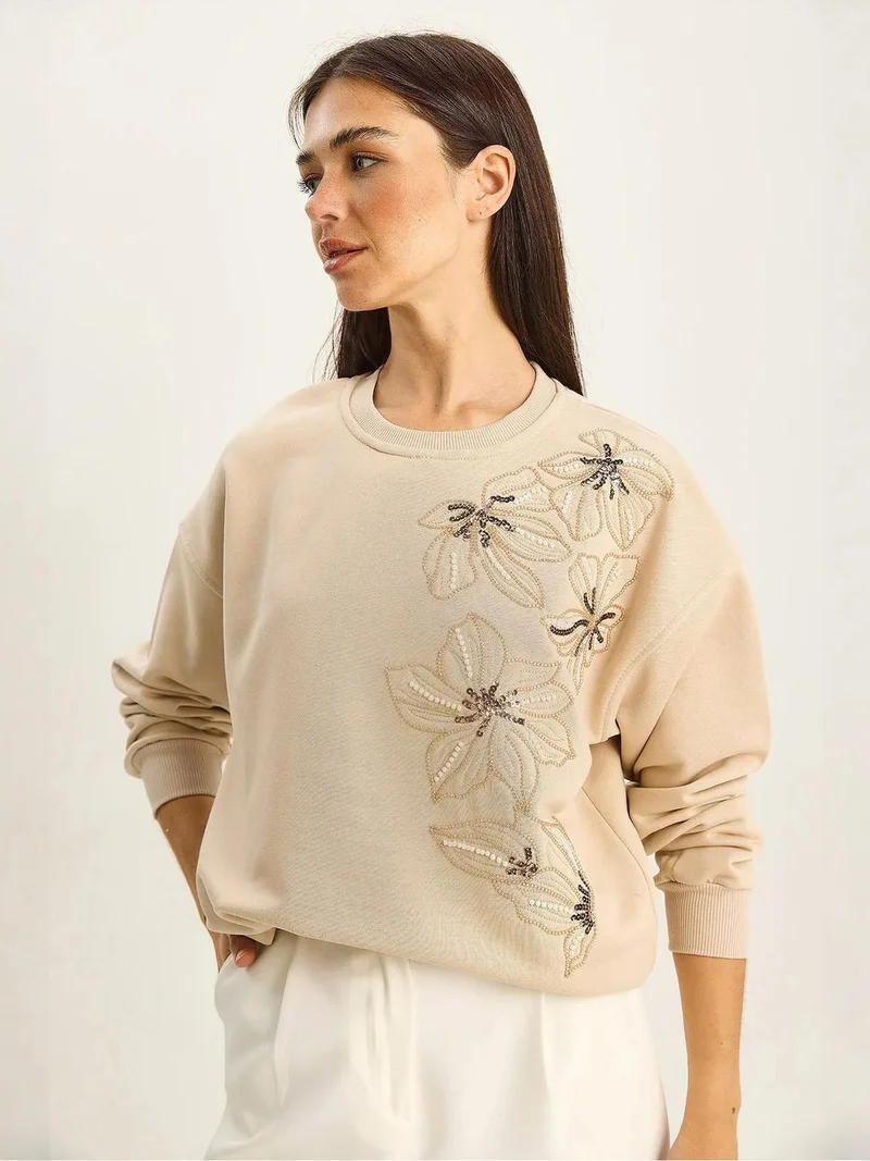 بيانكو لوتشي بلوفر لوكسي بنقشة زهور بياقة دائرية وقصة مريحة