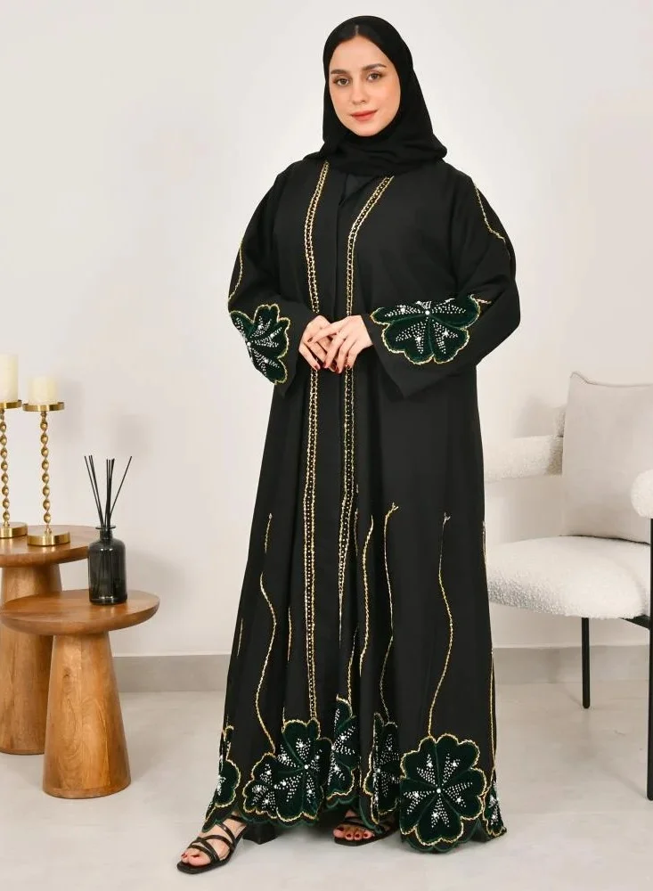 lamha abaya Black wrap abaya with prominent embroidery and olive green velvet overlay on flowers