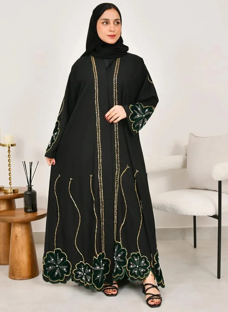 lamha abaya Black wrap abaya with prominent embroidery and olive green velvet overlay on flowers