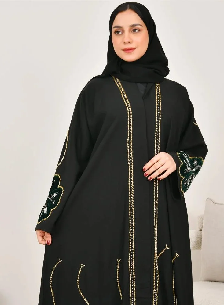lamha abaya Black wrap abaya with prominent embroidery and olive green velvet overlay on flowers