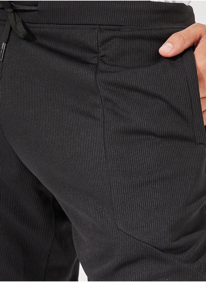 Styli شورت تدريبي مقاس 7 بوصات محبوك بجيوب  - Image 3