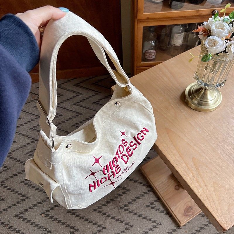 Women's Canvas Crossbody Bucket Bag - Image 1