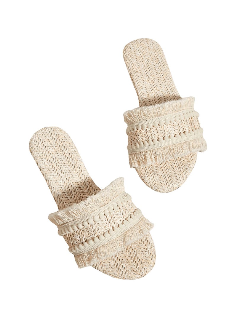OYOANGLE Women's Fringe Straw Sandals Crochet Open Toe Single Band Flat Slip On Sandals Beige 7 - Image 1