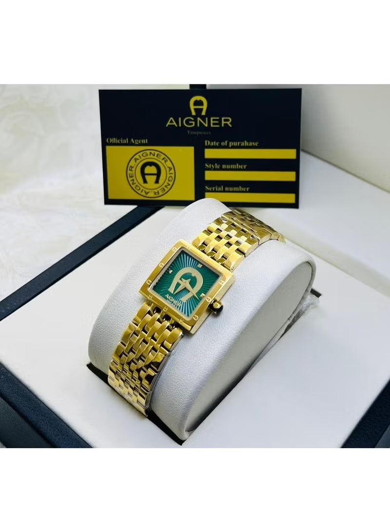 Click watch, gold with a green bezel