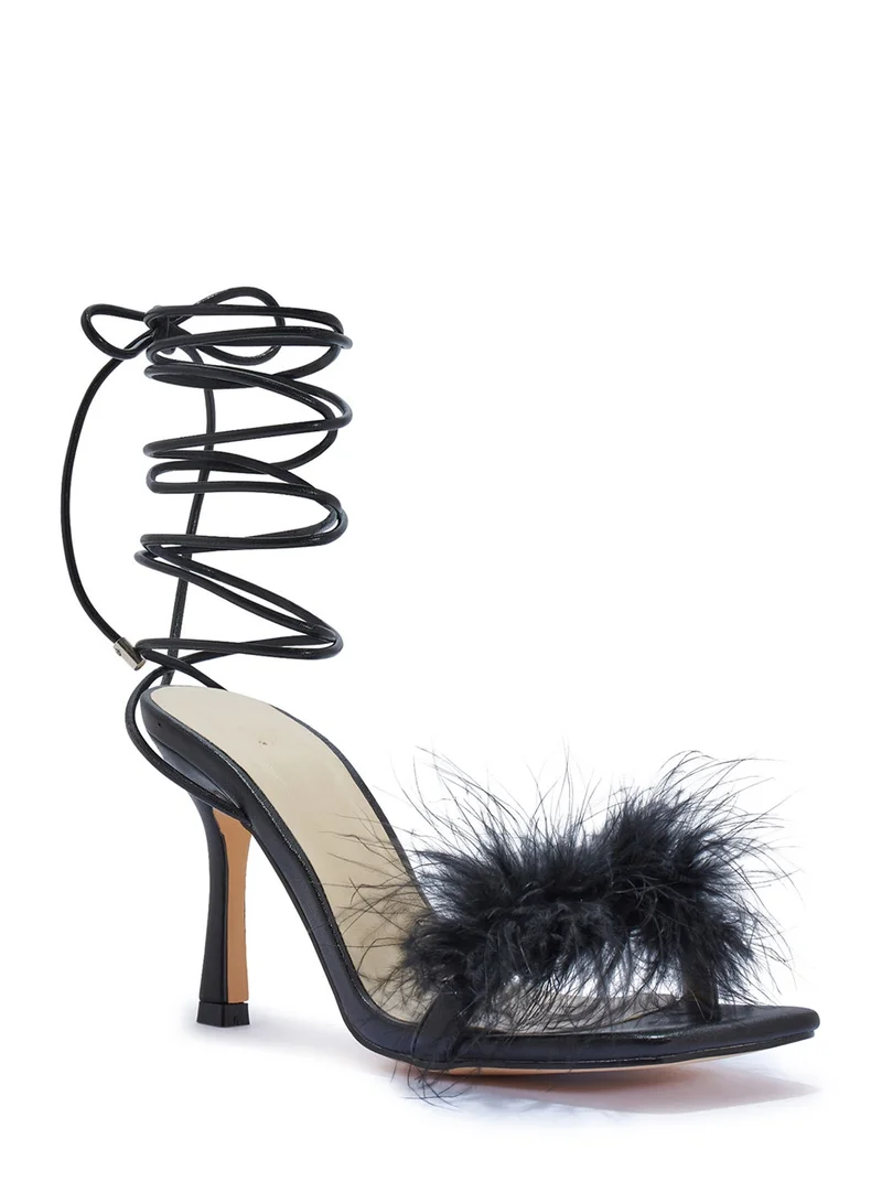 ترافل من نمشي صندل بكعب عالٍ ومنصة مع أربطة وريش