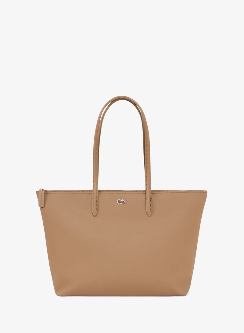 The iconic L1212 style in a large shopping bag