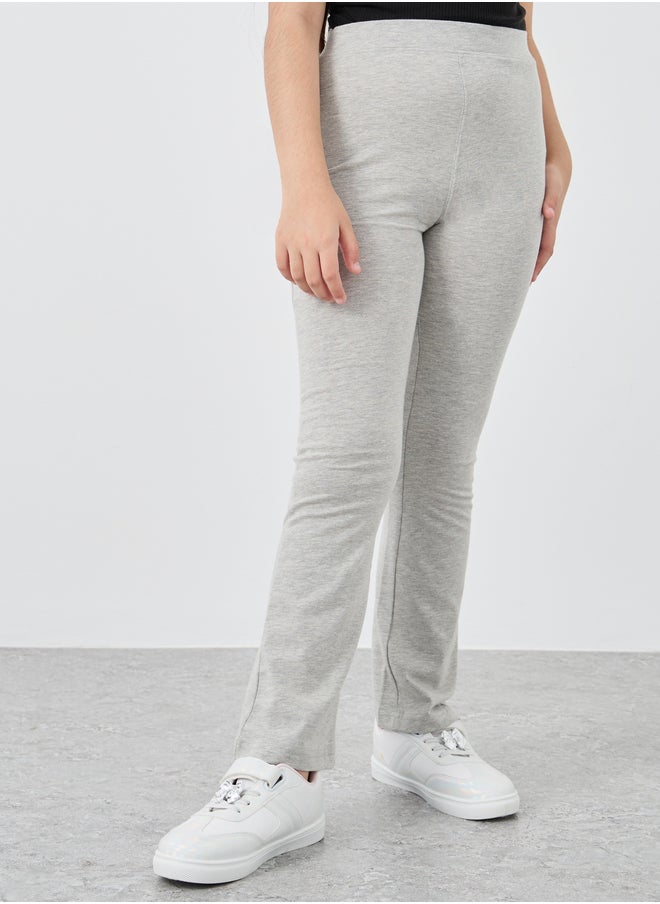Styli Styli Girls Grey Solid Elasticated Waistband Flared Leggings  - Image 1