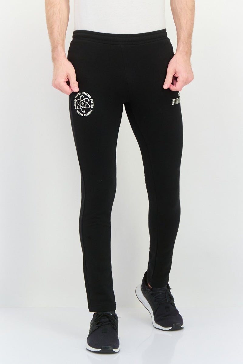 PUMA سروال تدريب ضيق للرجال، أسود - Image 1