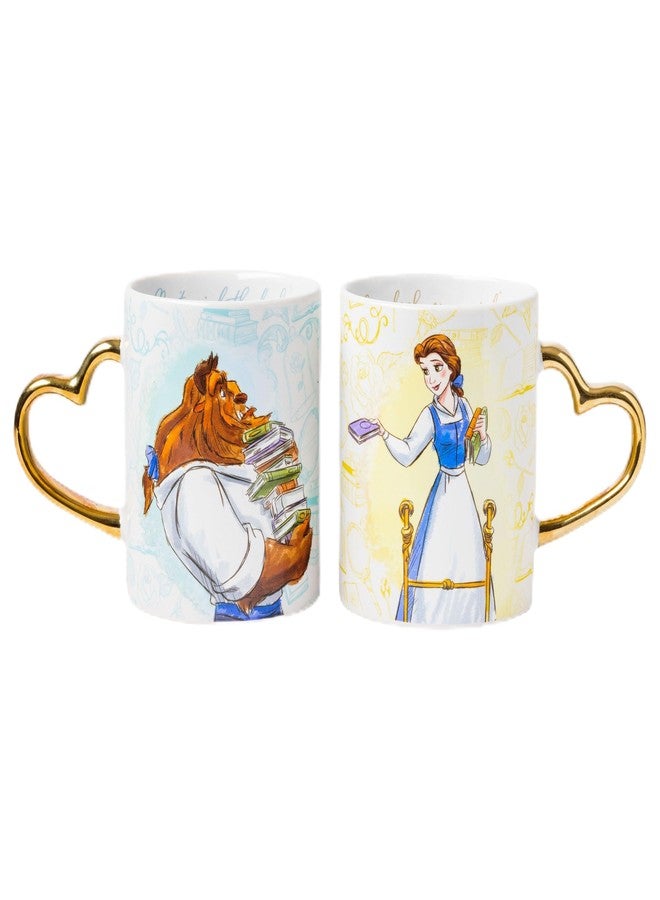Silver Buffalo Disney Princess Beauty and the Beast Don't Mind the Books Gold Heart Shaped Handle 2 Pack Ceramic Mug Set, 14 Ounces - Image 1
