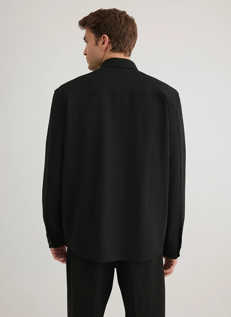 مافي قميص أسود